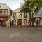 Shops and people along Duval Street in Key West, Florida.