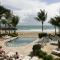 Beach resort pool with ocean view in San Juan, Puerto Rico.