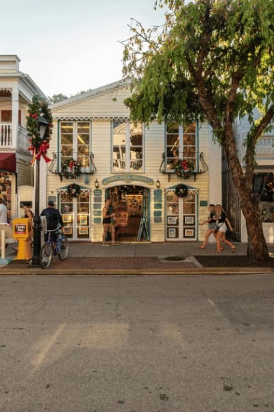 Shops and people along Duval Street in Key West, Florida.